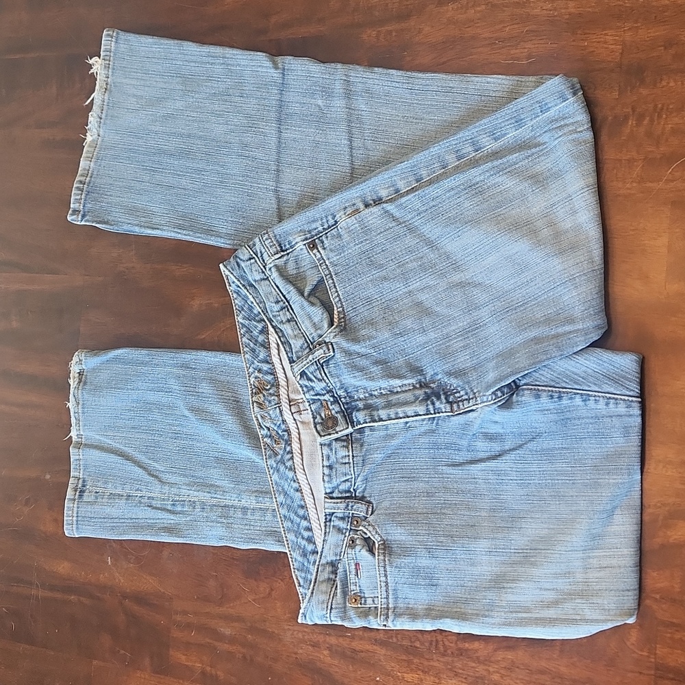 Tommy Hilfiger jeans. Distressed, light wash, worn pattern, size 8, boot cut